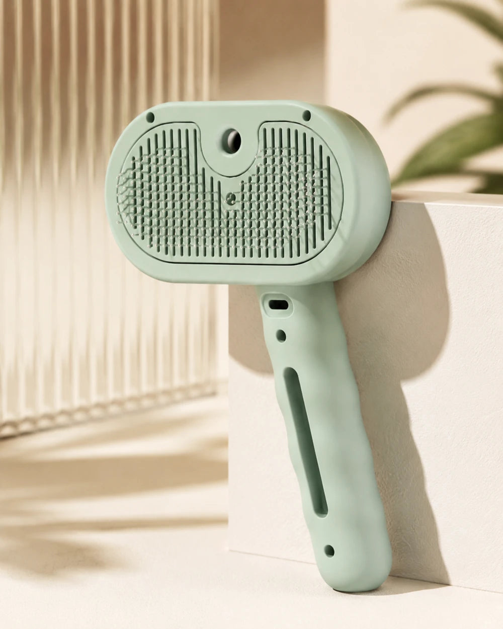 3-in-1 Steam Pet Brush - combined steam cleaning, shedding removal, and self-cleaning in one easy-to-use tool.