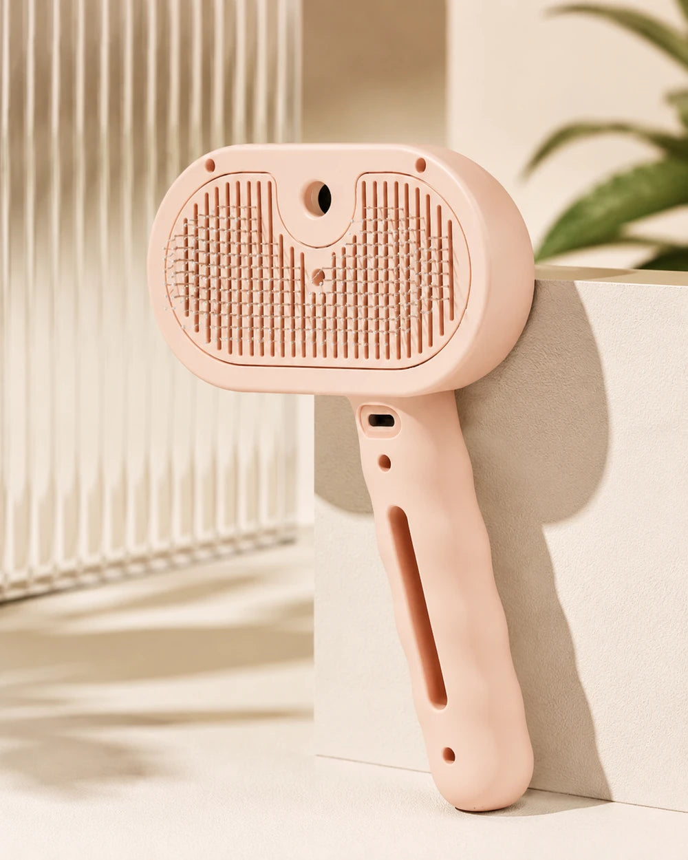 3-in-1 Steam Pet Brush - combined steam cleaning, shedding removal, and self-cleaning in one easy-to-use tool.